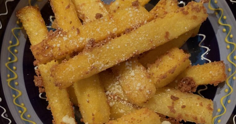 Crispy Polenta Fries baked on a pan