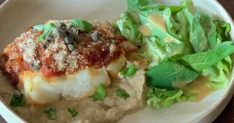 Baked Cod w/tomato & caper fondue on smoked eggplant puree